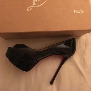 Brand new Christian Louibatons size 8